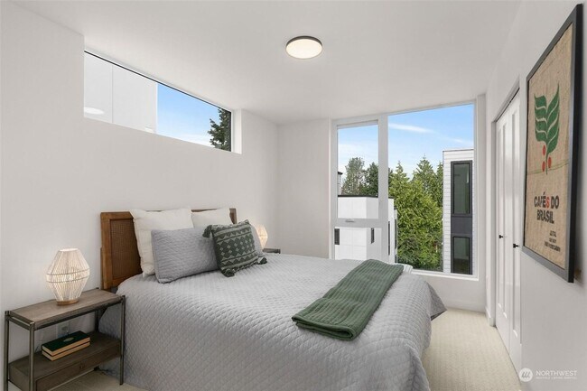 Building Photo - Welcome Home -Modern and Expansive Windows