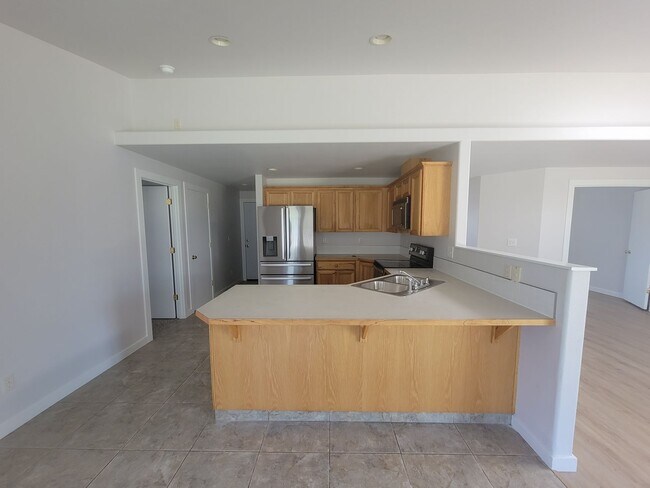 Building Photo - 4-Bedroom Gem in Pasco – Fresh Paint, New ...