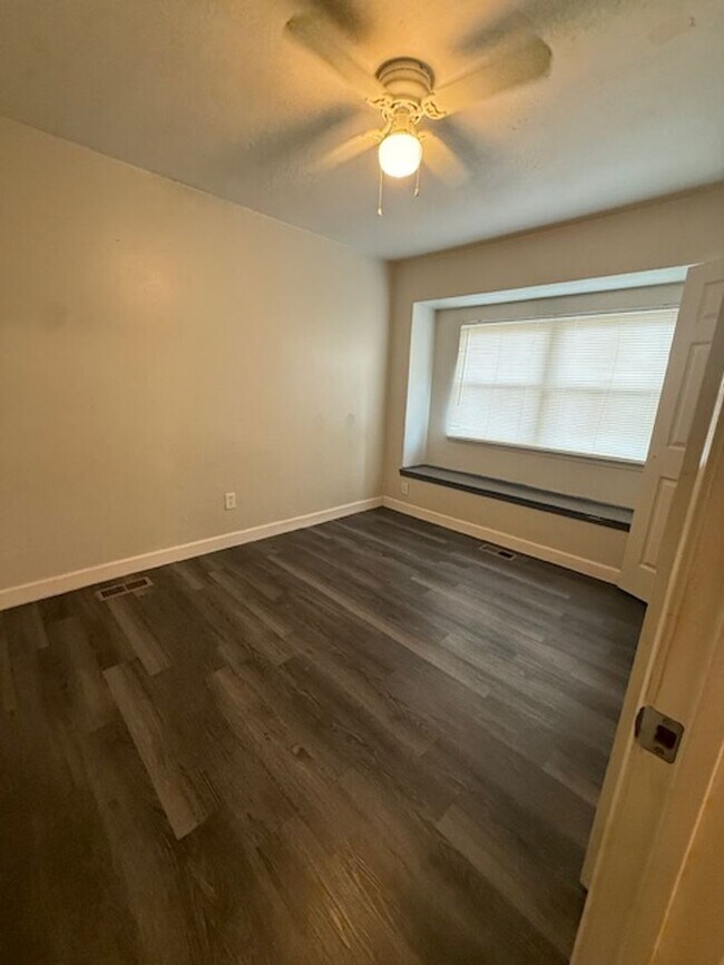 Building Photo - 3 bedrooms - 1.5 baths - Wood-look Floors ...
