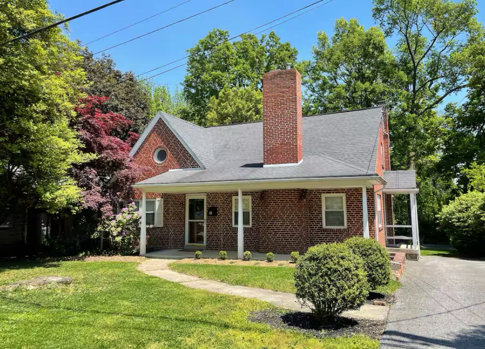 Front of home, apartment entrance is located at rear of home - 49 Riverside Ave