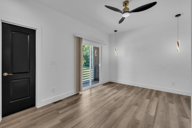 Building Photo - Modern New Construction Townhome with Roof...
