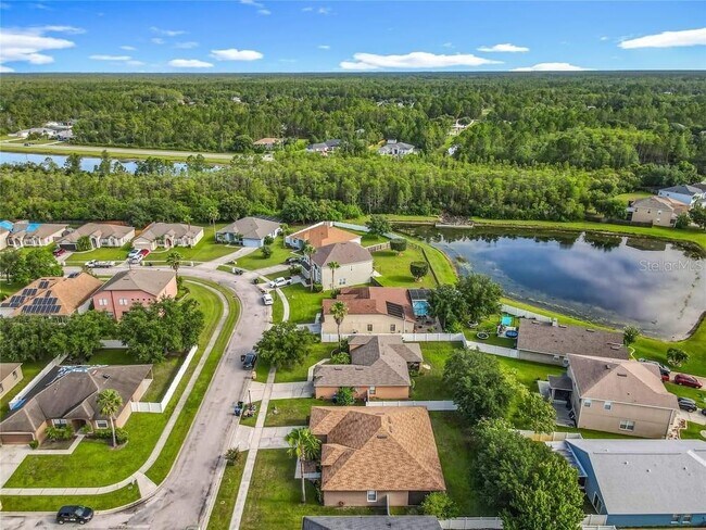 Building Photo - 2831 Village Pine Terrace