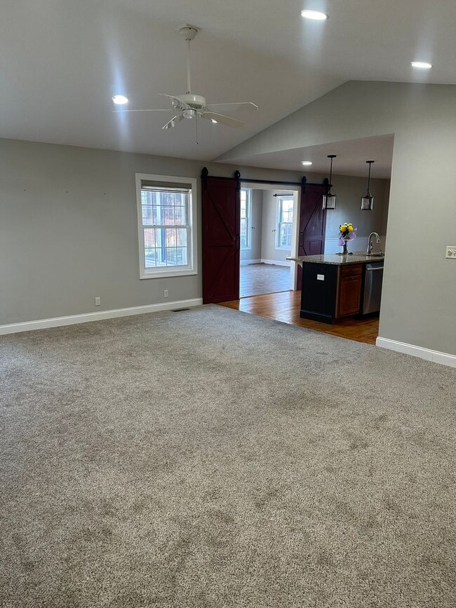 Building Photo - Welcome to this stunning 4 bedroom, 3 bath...