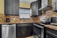 Building Photo - 6650 Royal Palm Blvd