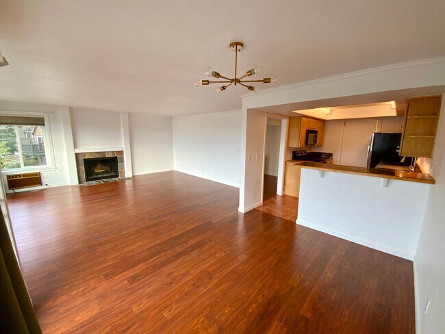 Building Photo - 1,300+ Sq Ft 2BR Condo w/ Parking, W/D & Utilities Included | $1,000 Move-In Credit