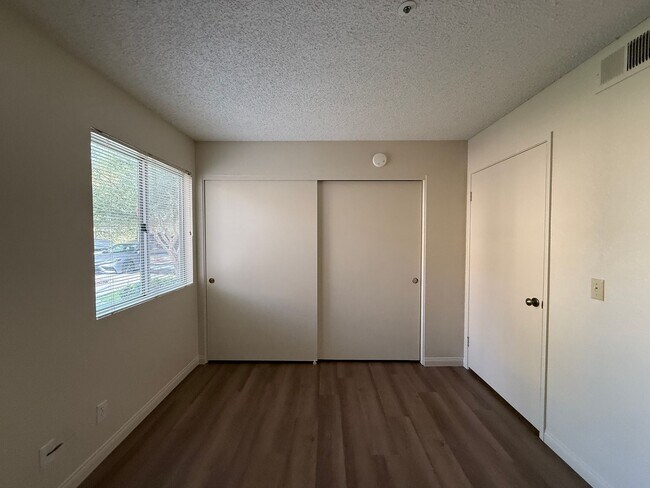 Building Photo - Downstairs Corner Condo in the Gated Community of Las Palmas