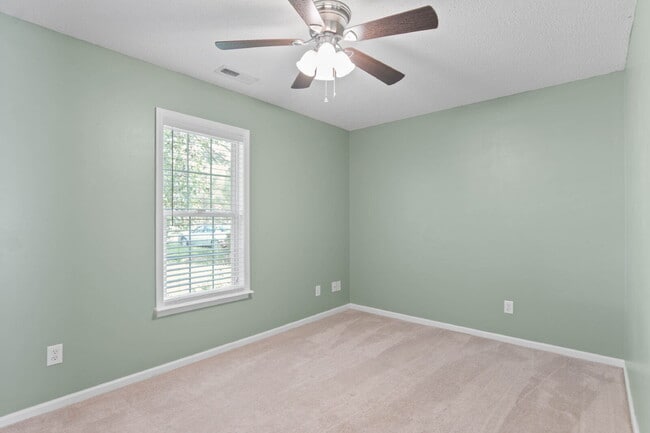 Building Photo - "Charming 3-Bedroom Sanctuary with 2 Full ...