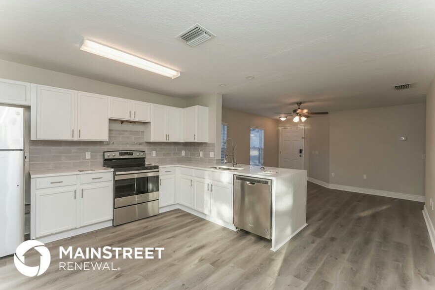 Building Photo - 11902 Mango Groves Blvd
