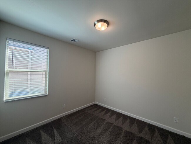 Building Photo - 3 Bedroom Plus Office Single Story New Construction Available Near Woodmont Ave NW & Rainbow Blvd...