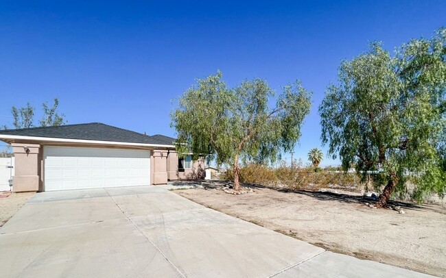 Building Photo - A 4 Bedroom 2 Bath Home with Attached Two ...