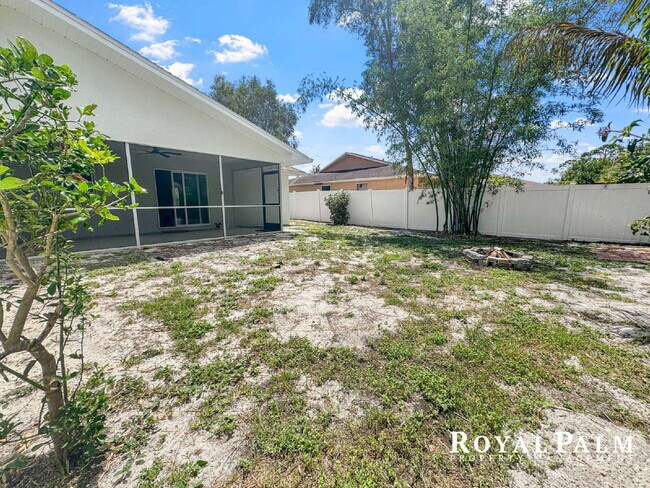 Building Photo - Tree-Lined 2BR/1BA Fort Myers Duplex with Fenced Yard, Storage Shed & In-Unit Laundry!