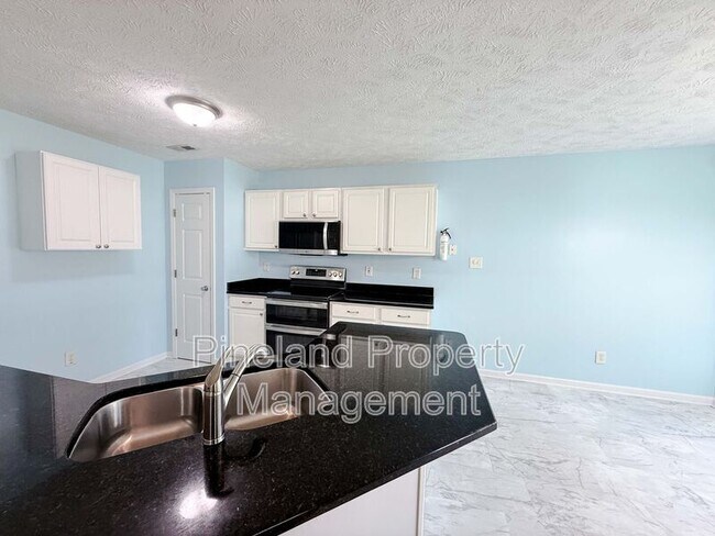 Building Photo - 219 Woodland Dr