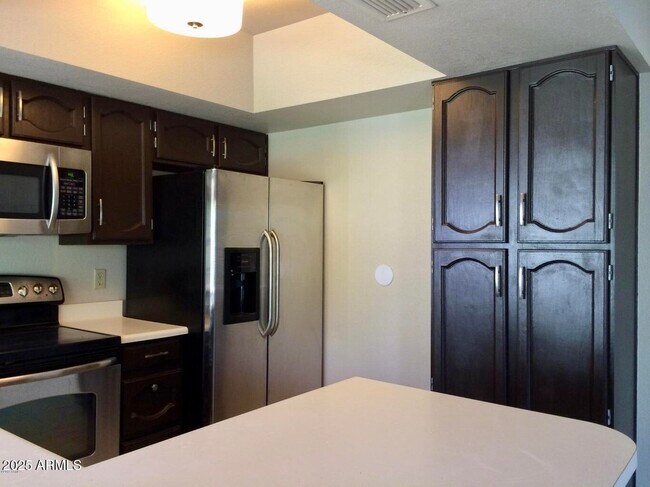 Building Photo - 8878 E Sheena Dr