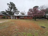 Building Photo - Under the cherry blossom tree, one did see, the cutest house on Sandra ever to be!