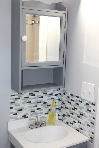Bathroom cabinet &amp; sink. - 1011 Main St
