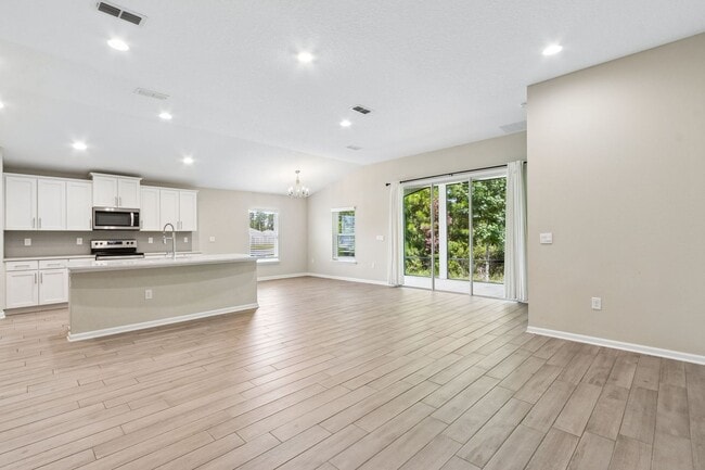 Building Photo - Modern 4BR Home with 3 Full Baths in River Glen | Screened Porch & Resort-Style Amenities