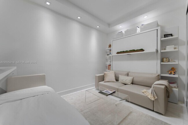Building Photo - 10203 Collins Ave
