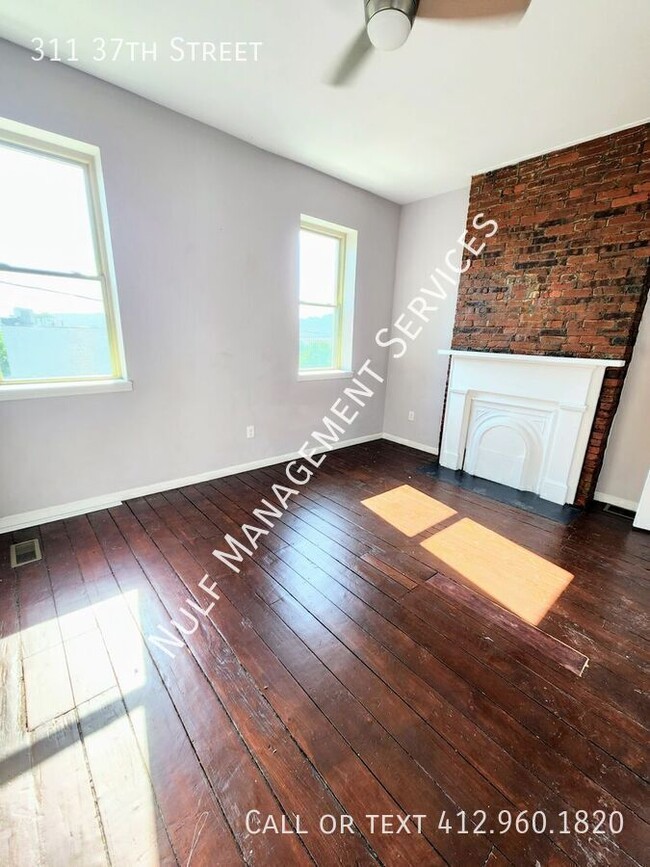 Building Photo - 311 37th St
