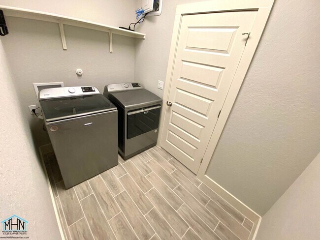 Building Photo - Smart Home Haven: Where Comfort Meets Cool...