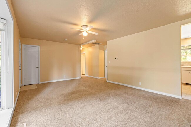 Building Photo - Charming, retro 2-bdrm/2-bath ranch in tranquil setting w/ large family room