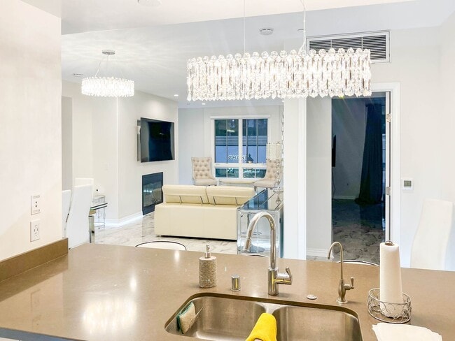 Building Photo - Experience Elevated Living at The American...