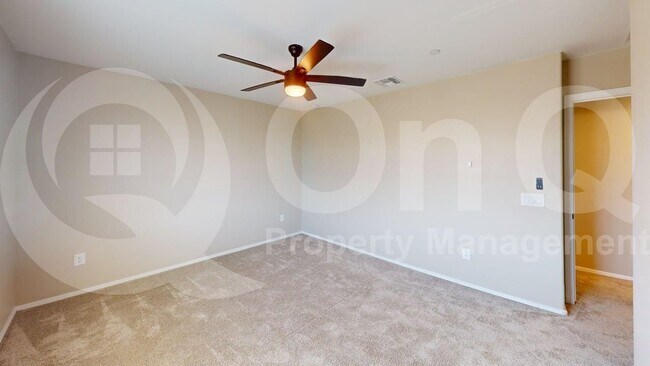 Building Photo - 10587 W Chadwick Dr