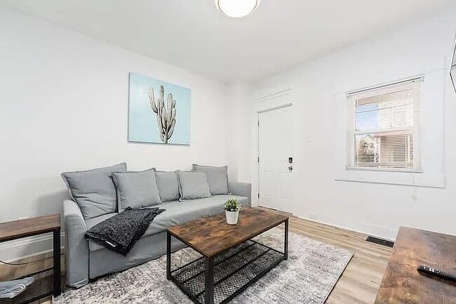 Building Photo - This updated 2-bedroom townhouse offers comfortable living in the heart of Olde Towne East. .