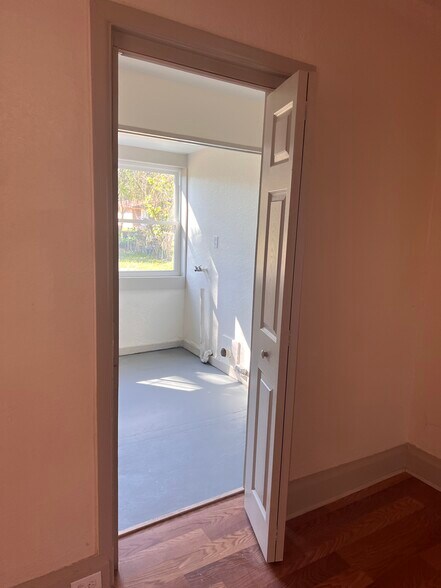 Family room looking into laundry room - 2821 W 11th St