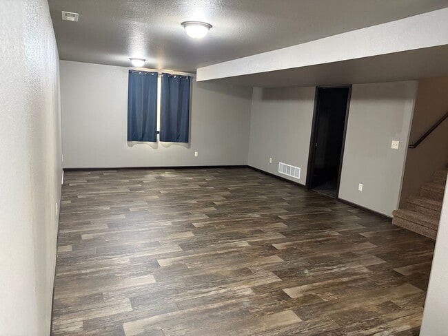 Building Photo - Modern 3-Bedroom Gem with Spacious Basement and Fenced Yard in Box Elder