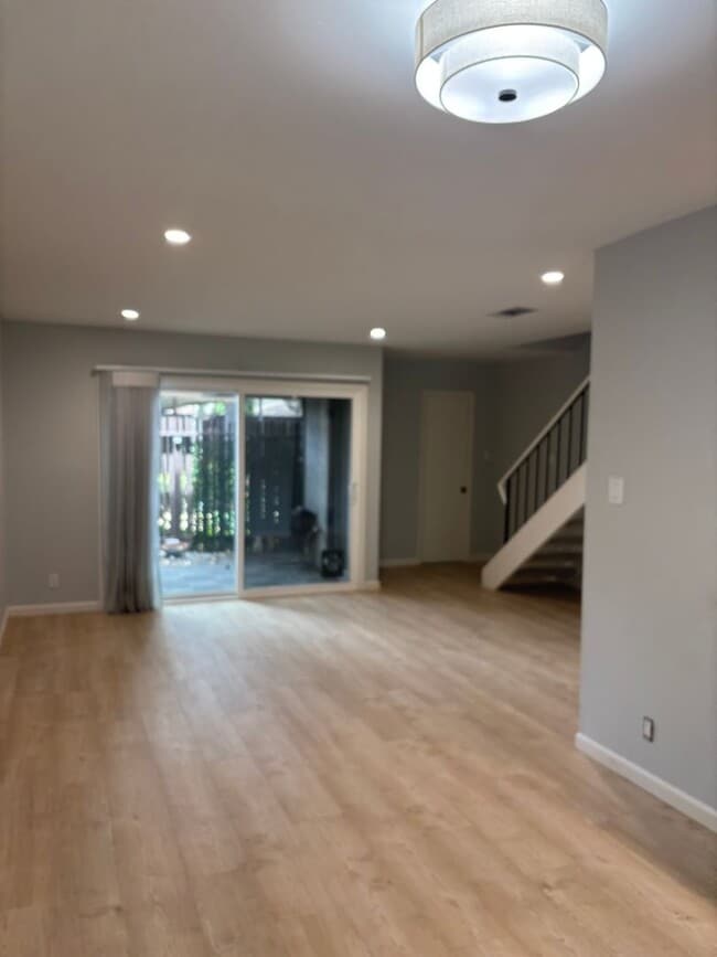 Building Photo - Stylish & Sun-Filled Condo with Private Patio in Prime Concord Location