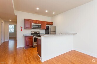 Building Photo - 2 br, 1 bath Triplex - 1405 N SYDENHAM ST ...