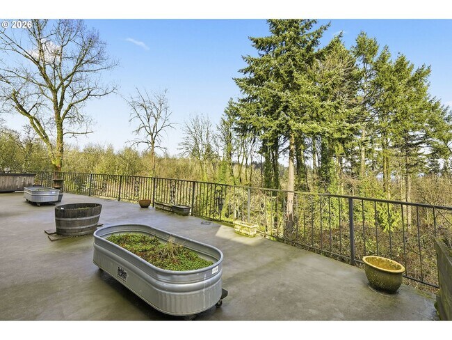 Building Photo - One-of-a-Kind 5BR Home with Floor-to-Ceiling Windows, Wraparound Decks & Breathtaking Treeline Views