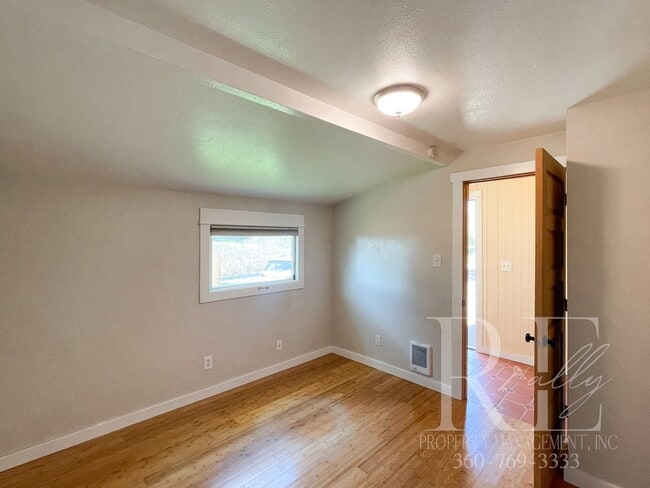 Building Photo - Whimsical Craftsman with Wraparound Porch, Bonus Room & Liberty Bay Peek Views