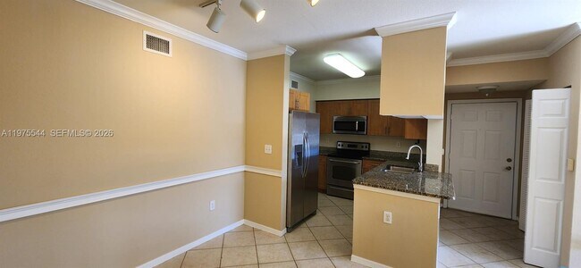 Building Photo - 6482 Emerald Dunes Dr