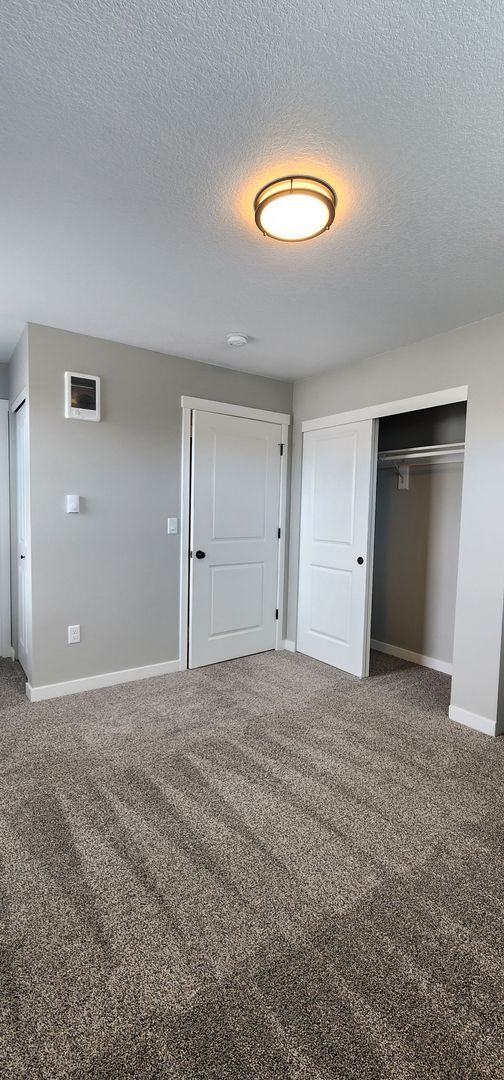 Building Photo - MOVE IN SPECIAL! New Construction Duplex i...
