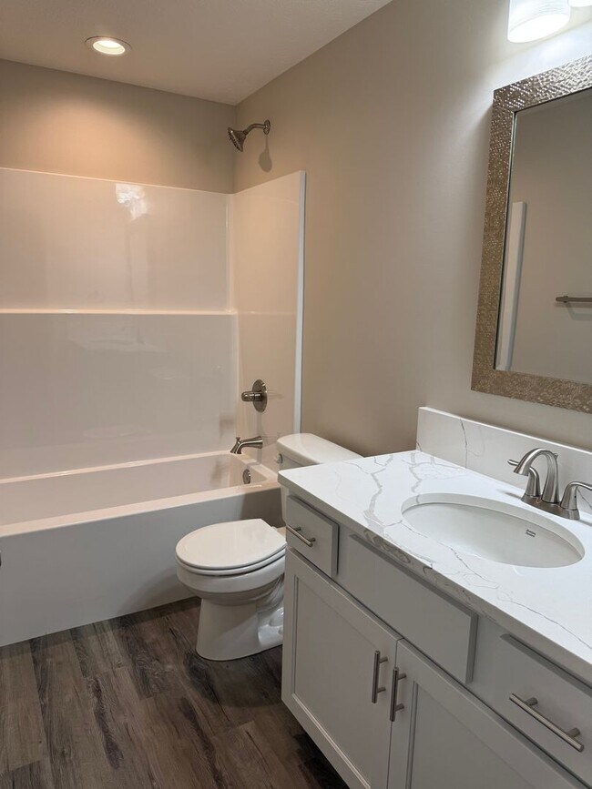 Building Photo - Beautiful brand-new ranch townhome with 2 stall garage. Spacious 3 bedrooms/3 full bathrooms