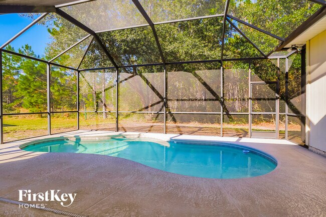 Building Photo - 9241 Hawks Run Ln