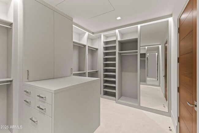 Building Photo - 6587 N Palmeraie Blvd