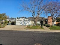 Building Photo - Cute and updated Clovis home offering wonderful amenities, good size lot, a bid backyard + potent...