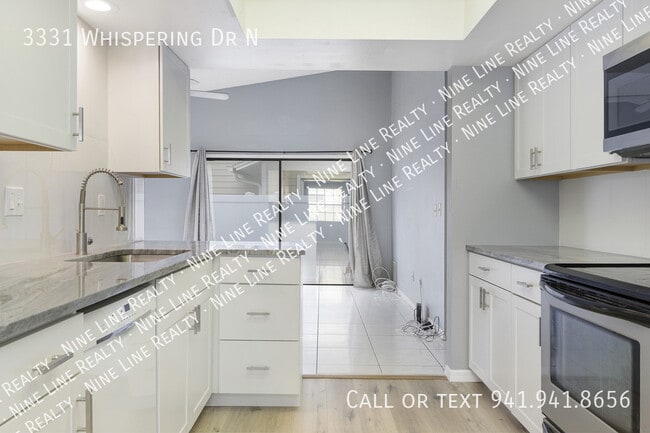 Building Photo - 3331 Whispering Dr N