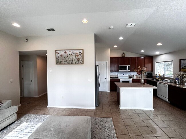 Building Photo - Newer Build 3/2 with Fenced in yard minute...