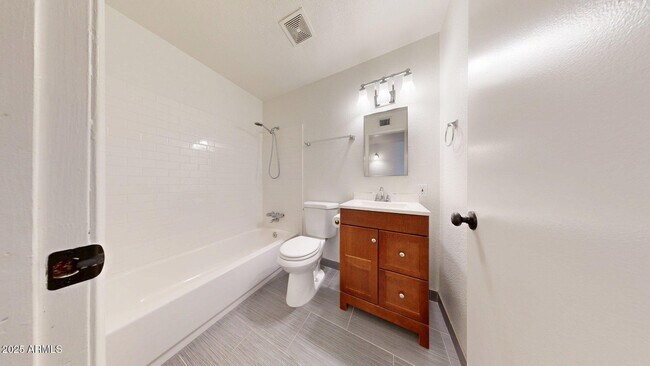 Building Photo - 830 E Orchid Ln