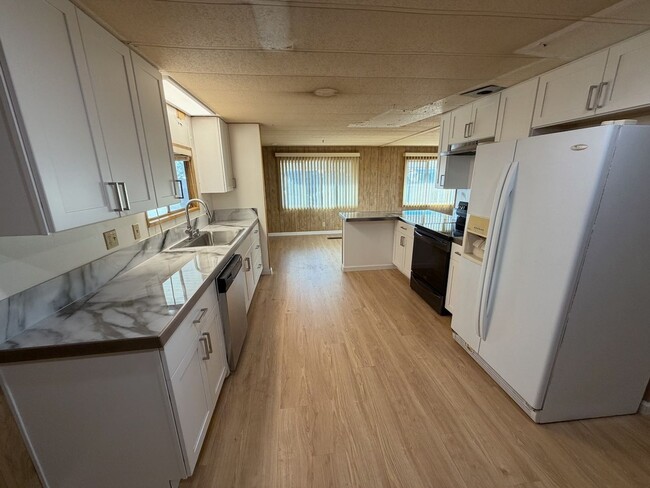 Building Photo - Retire in Style: Your Dream Home in one of...