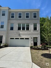 Building Photo - SPACIOUS TOWNHOME