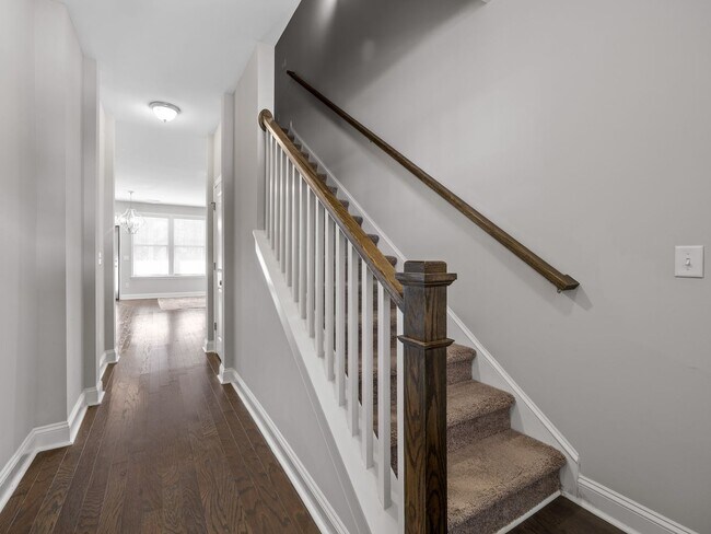 Building Photo - **MOVE IN SPECIAL! 50% off first month's rent!!** Spacious 4BR Townhouse with 2-Car Garage Near D...