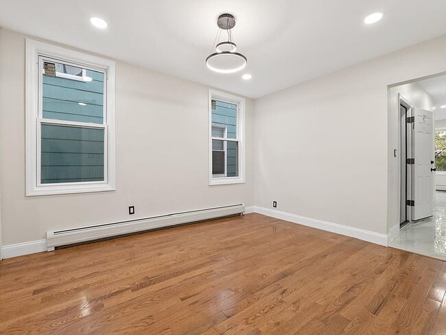 Building Photo - 3-Bedroom Gem with Modern Comfort in Bayonne – 1300 Sq. Ft. of Urban Living!"