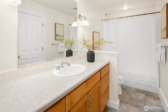 Building Photo - Light-Filled Magnolia Home with Spectacular Northwest Views