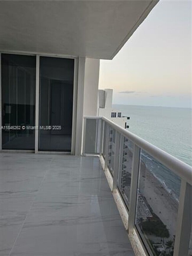 Building Photo - 19111 Collins Ave