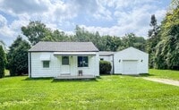 Building Photo - Nice 2bd / 1 ba house with attached garage...