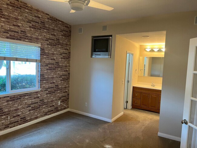 Building Photo - 55+ ONLY community gorgeous ranch style 2BR/2BA home with laundry, parking and community amenities